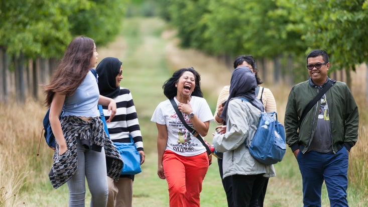 A group of walkers laughing on a walk